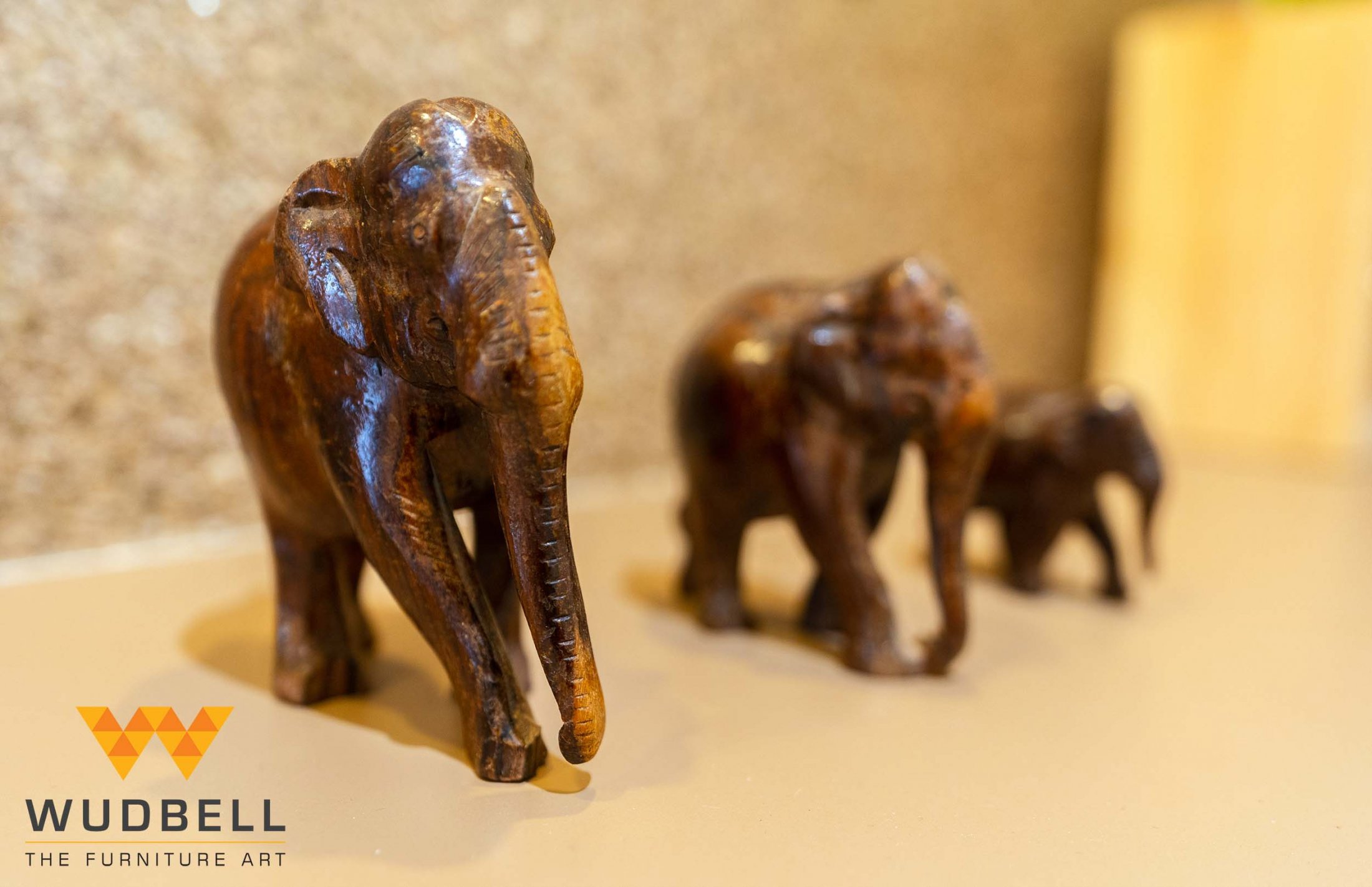 Wooden carved elephant sculptures amplifying the artistic touch